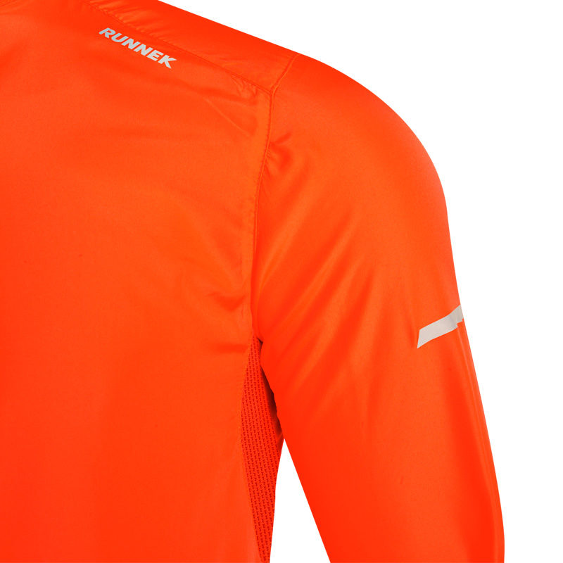 veste coupe-vent orange fluo